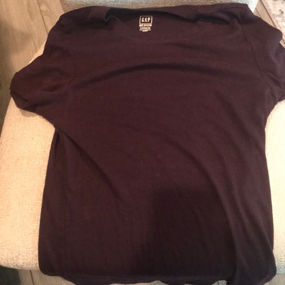 A purple shirt that’s from gap